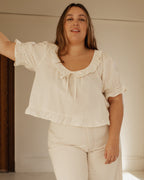 delicate, short-sleeve girly blouse with frills