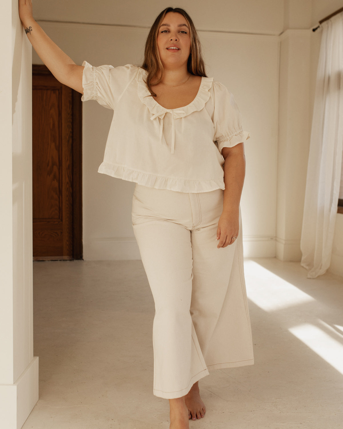 high-waisted wide leg pants in a creamy white