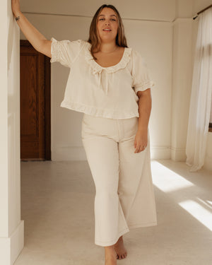 high-waisted wide leg pants in a creamy white