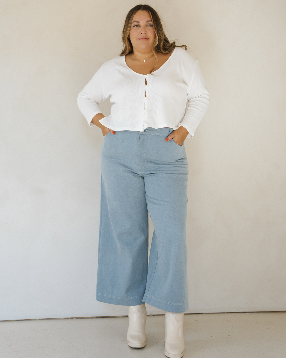 light denim wide-leg crop pants with belt loops and front pockets