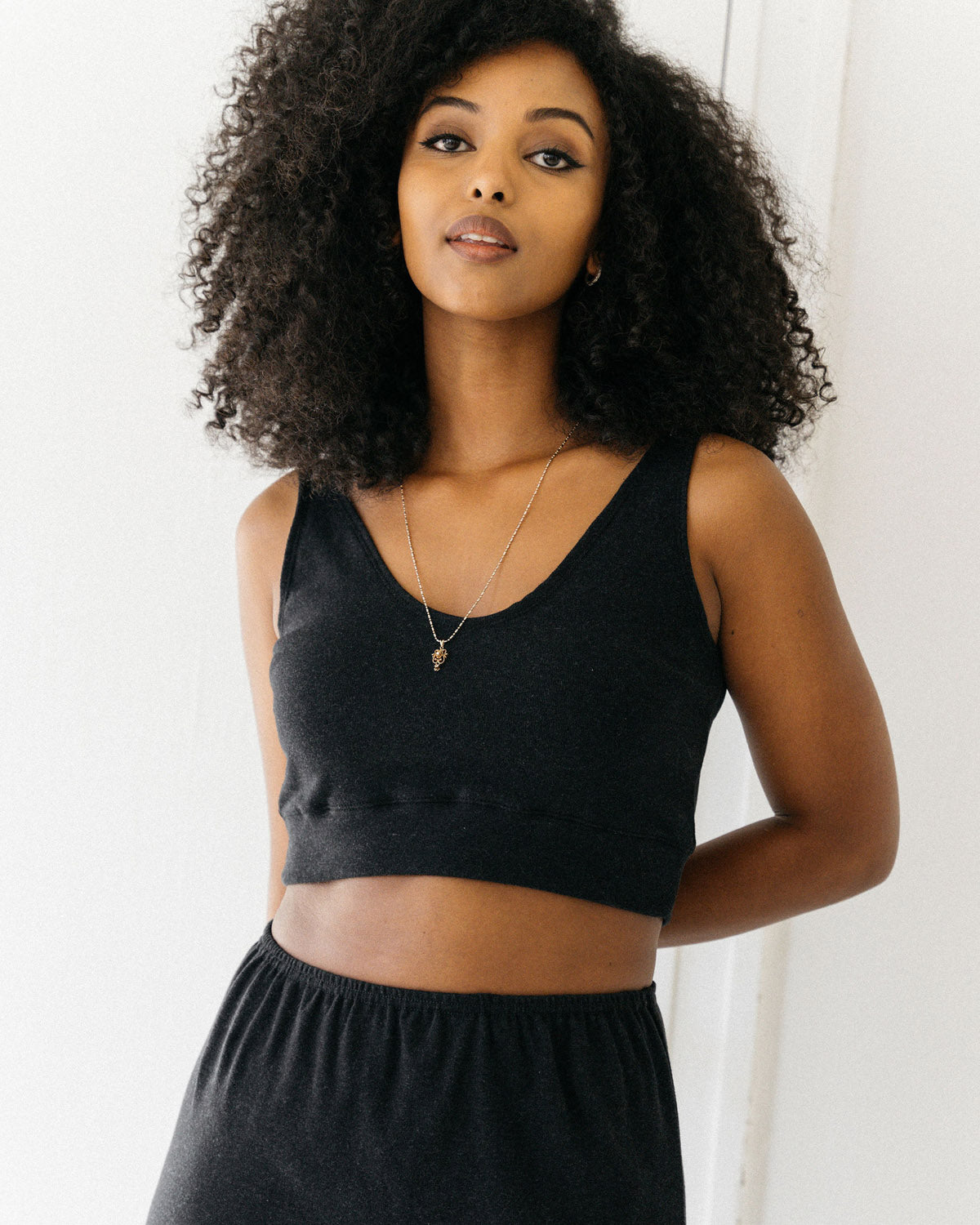 black knit top made from 100% organic cotton