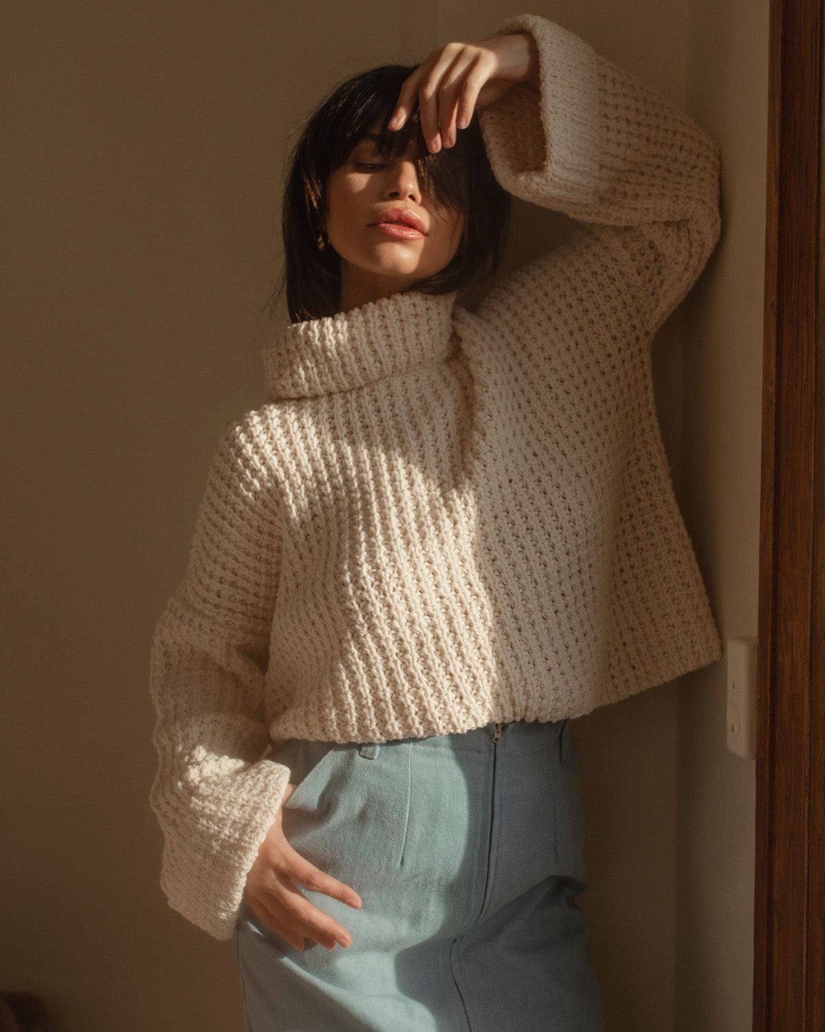 cream mockneck sweater made from cotton, wide sleeves