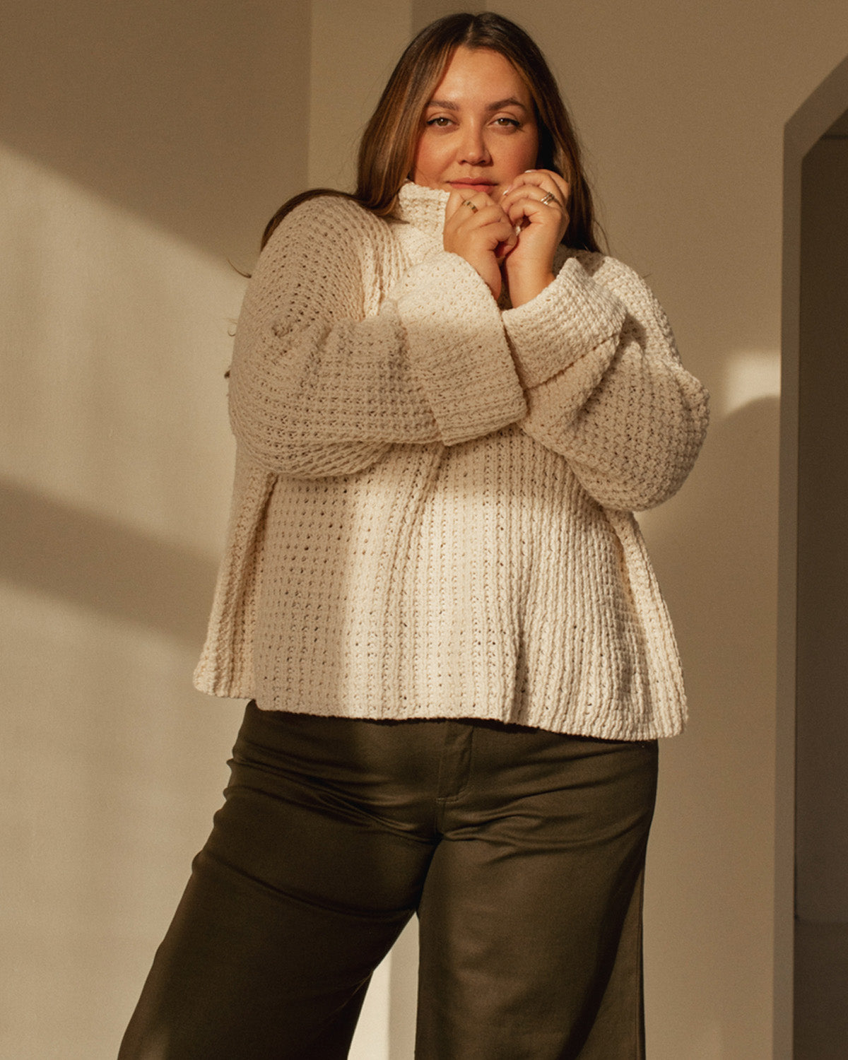 cream mockneck sweater made from cotton, wide sleeves