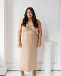 Tan, stretchy cropped tank top made of organic cotton