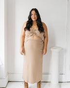 Tan, stretchy cropped tank top made of organic cotton