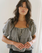 puff sleeve blouse in houndstooth pattern