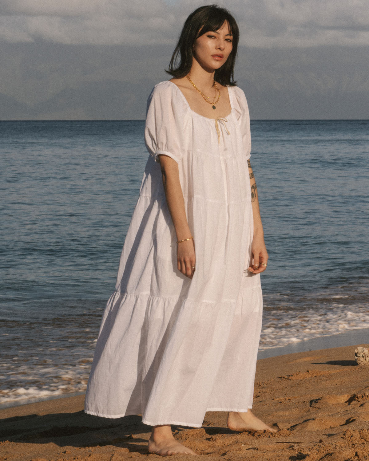 white puff sleeve, tiered dress made from organic cotton