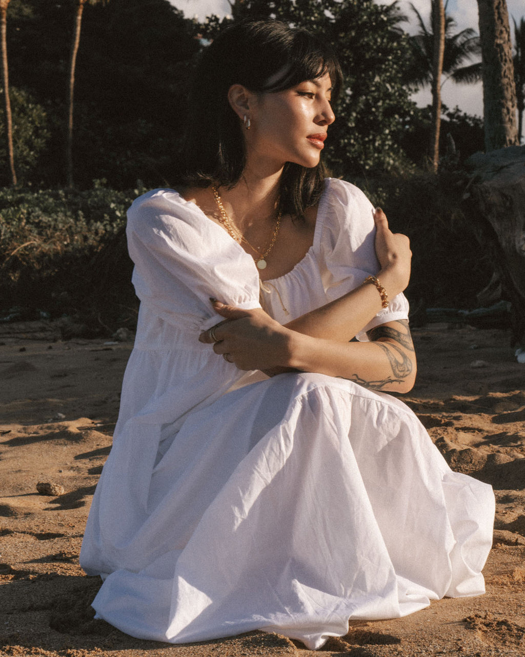 white puff sleeve, tiered dress made from organic cotton