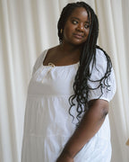 white puff sleeve, tiered dress made from organic cotton