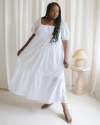 white puff sleeve, tiered dress made from organic cotton