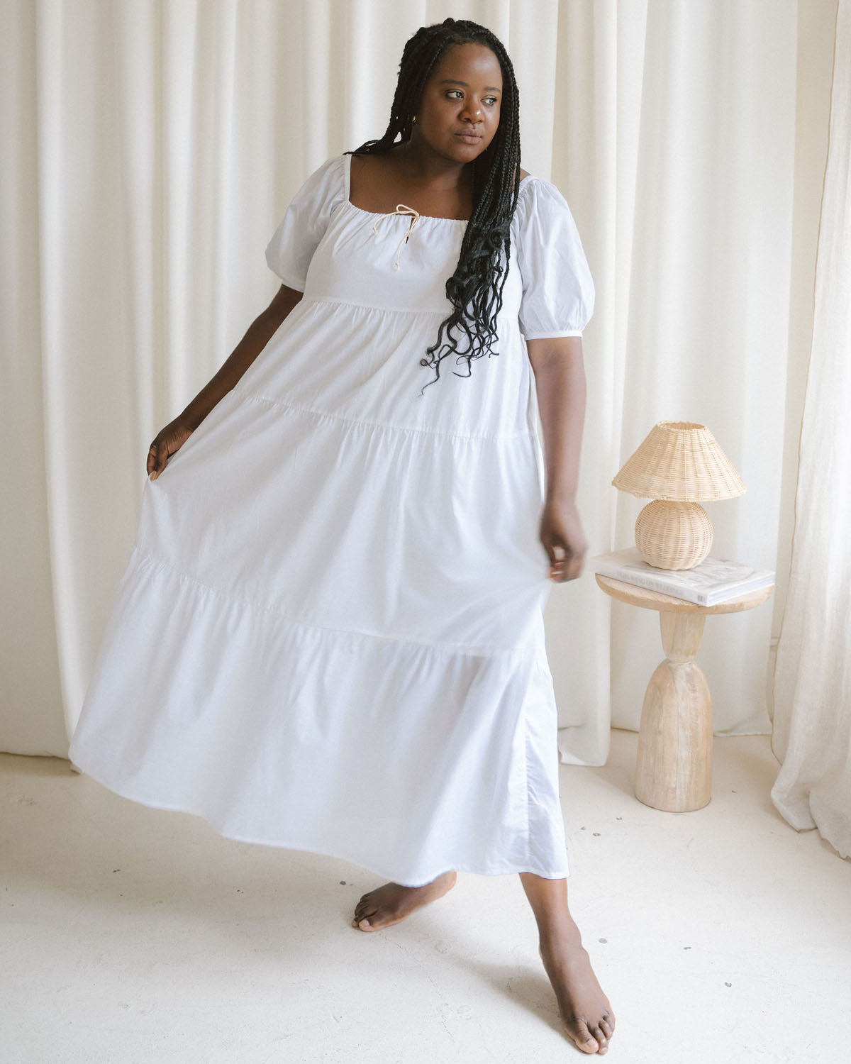 white puff sleeve, tiered dress made from organic cotton