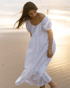 white puff sleeve, tiered dress made from organic cotton