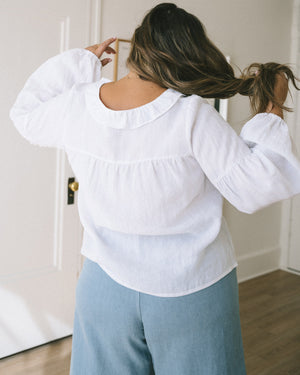 white linen long sleeve blouse with puff sleeves